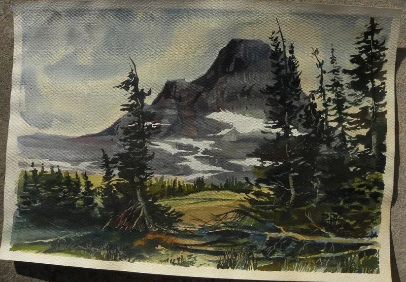 Watercolor painting of dramatic western mountain