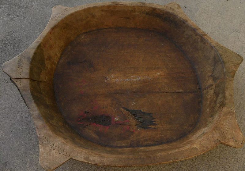 Old wooden carved chapati bowl from India used to make flatbreads
