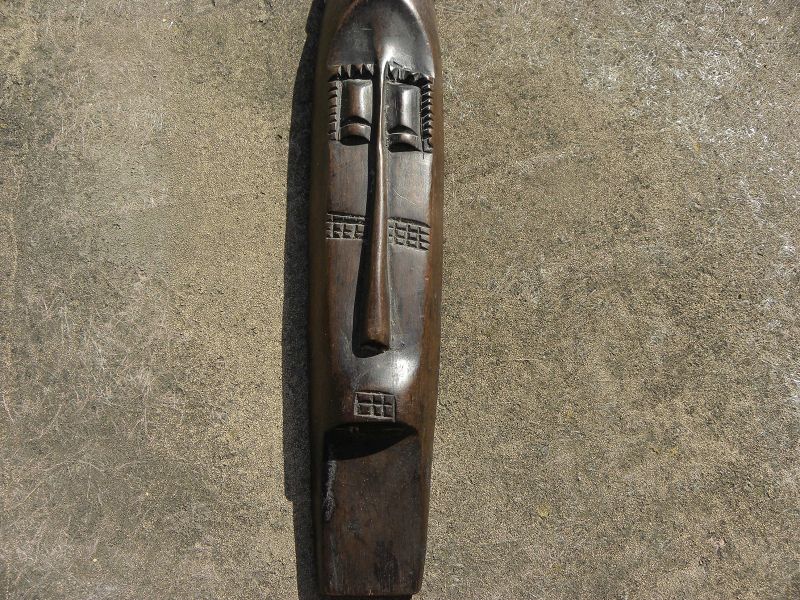 African art dark wood sculpture hand carving to hang on wall