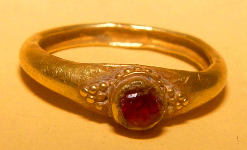 Ancient Gold Ring with a Dark Red Ruby