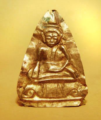 Gold Repousse Buddha Sitting on a Singhasana - 15C.