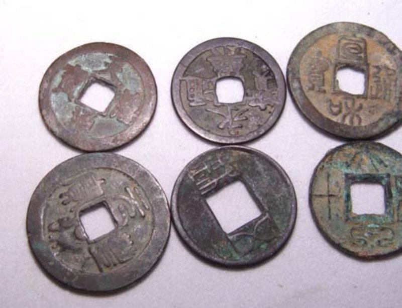 Eleven Han Dynasty Coins - 220 BC - 220 AD
