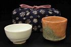 Red raku small tea cup by the master Sadamitsu Sugimoto