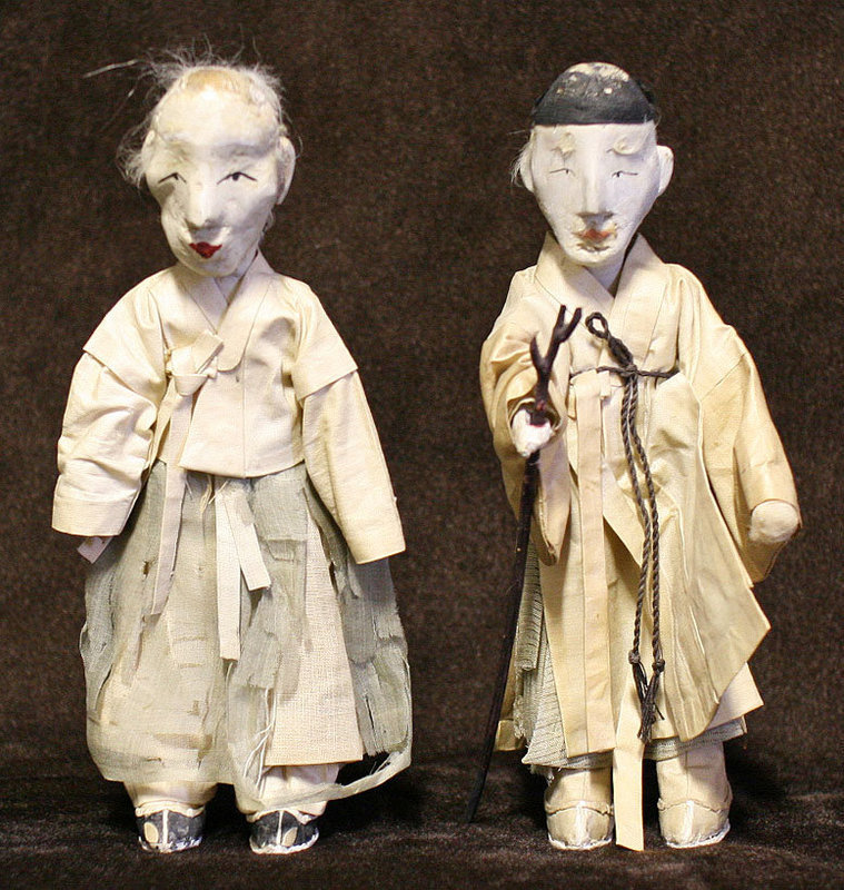 Korean Antique Dolls with Warm Faces and Bent Posture