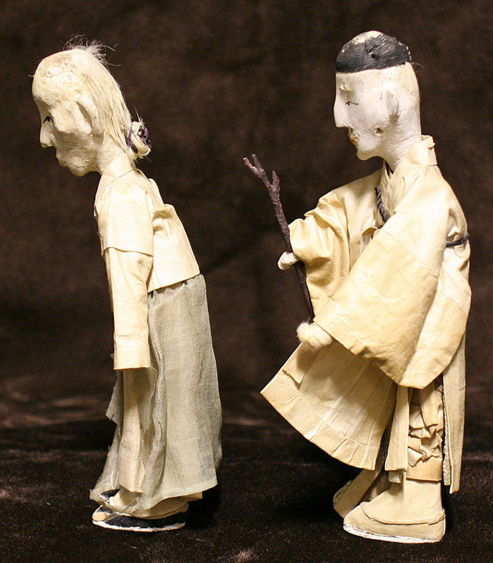 Korean Antique Dolls with Warm Faces and Bent Posture