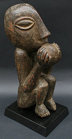 Nepalese Temple Sculpture of a Monkey Eating a Mango