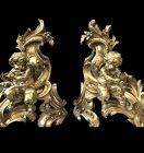 MATCHED PAIR OF FRENCH LOUIS XVI BRONZE ANDIRONS IN THE FORM OF PUTTI