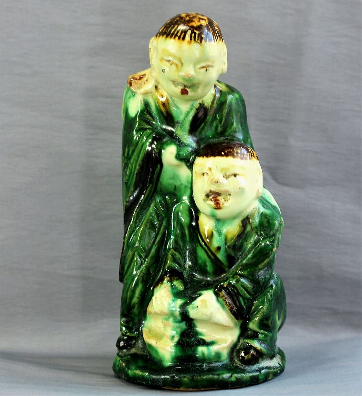 Chinese pottery Figure, two(2) men with large fish