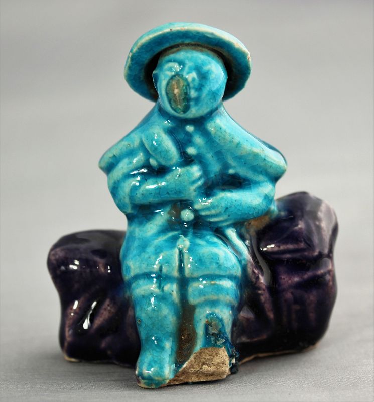Chinese Porcelain Figure with hat