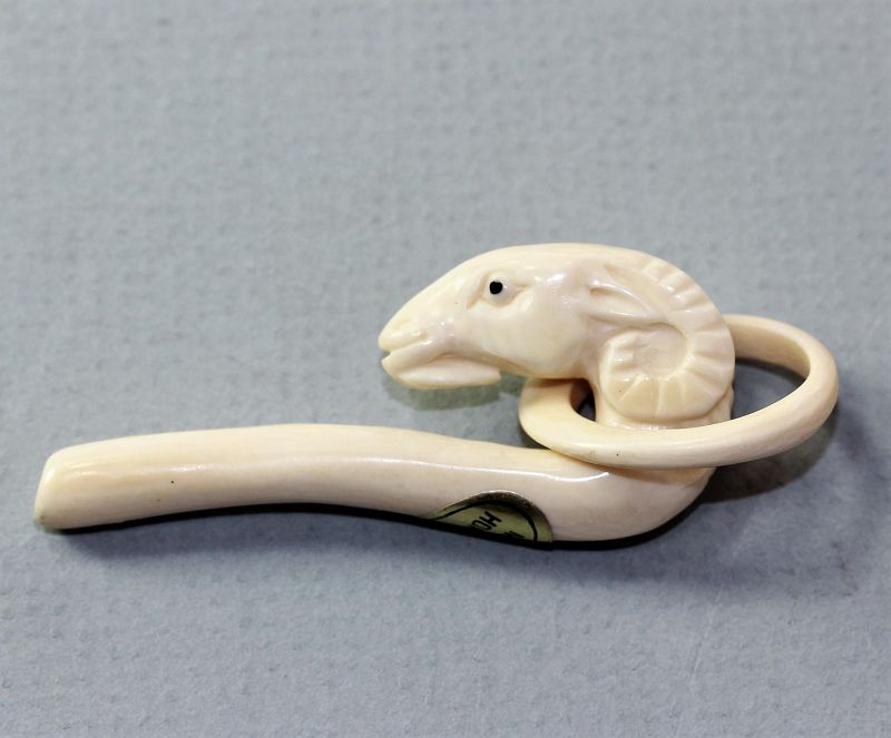 Chinese carved Ivory Ram's head clasp