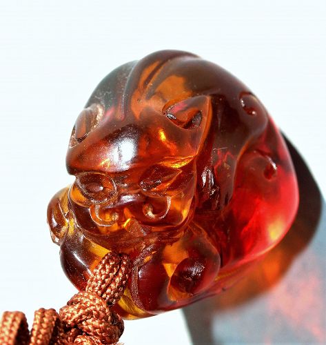 Chinese Amber carved Chimera Ornament with Macrame knot