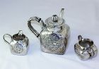 Chinese Export Silver Dragon Tea set, 3 pieces, hand hammered