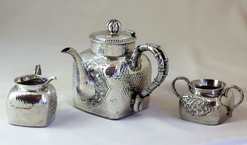 Chinese Export Silver Dragon Tea set, 3 pieces, hand hammered