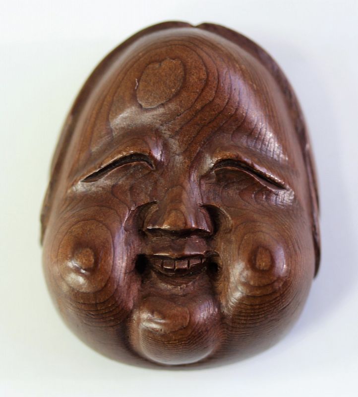 Japanese carved Wood No Mask Okame Netsuke,  Meiji period