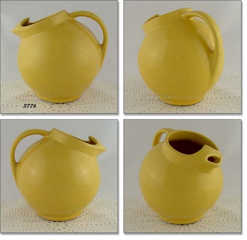 McCOY POTTERY – EARLY BALL SHAPED PITCHER / JUG (YELLOW