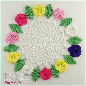 CROCHET DOILY WITH DIFFERENT COLOR FLOWERS