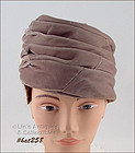 TAUPE COLOR TURBAN STYLE HAT WITH ACCENT FEATHERS