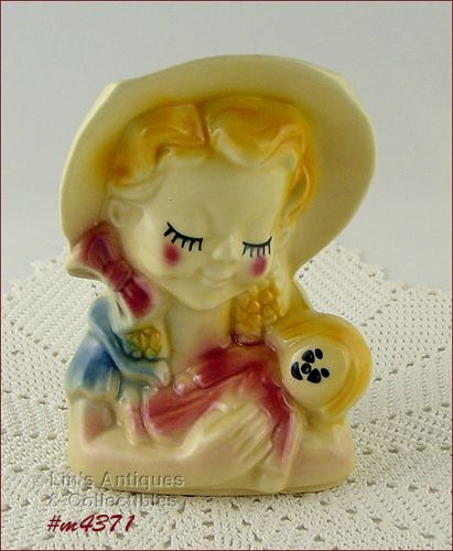 Shawnee Pottery Girl Holding Doll Wall Pocket