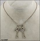 Marked Tag 1928 Necklace with Rhinestone Keys Pendant