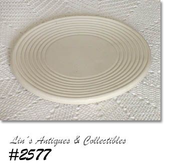 McCOY POTTERY -- WHITE TRIVET