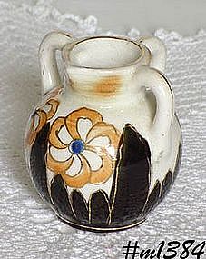 OCCUPIED JAPAN -- SMALL CREAMER WITH 3 HANDLES