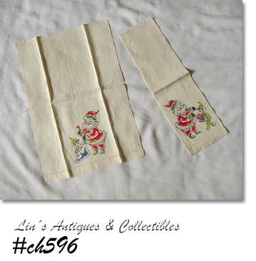 VINTAGE SET OF 2 HAND EMBROIDERED SANTA CHRISTMAS TOWELS