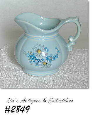 McCOY POTTERY -- BLUE PITCHER WITH BLUE FLORAL DESIGN