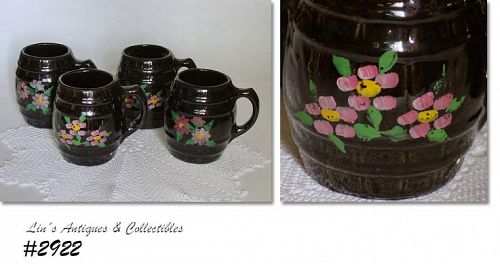 McCOY POTTERY -- BARREL MUGS, BLACK WITH FLOWERS