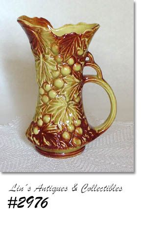 McCOY POTTERY GRAPES AND LEAVES PITCHER VASE YELLOW WITH BROWN ACCENTS