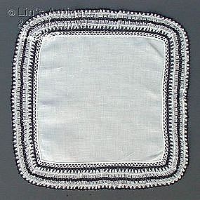 WHITE HANDKERCHIEF WITH BLACK AND WHITE CROCHET EDGING