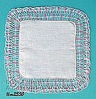 WHITE HANDKERCHIEF WITH PINK AND BLUE CROCHET