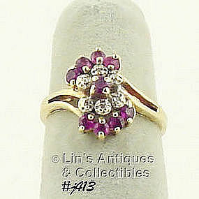 10K RING WITH RUBIES AND DIAMONDS (SIZE 4 1/2)