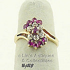 10K RING WITH RUBIES AND DIAMONDS (SIZE 4 1/2)