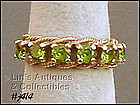 10K PERIDOT BAND RING (SIZE 6 1/2)