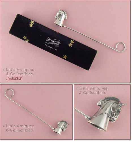 VINTAGE CANDLE SNUFFER FROM UTTERBACKS JEWELERS
