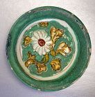 Liao Sancai Saucer Dish with Green Glaze, incised with Haitang Flower