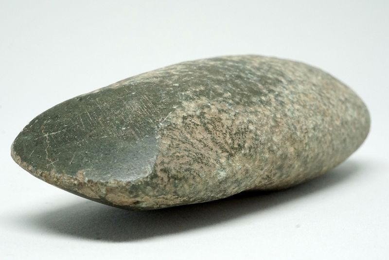 A Polished Green Hard-stone Axe, Yangshao Culture.