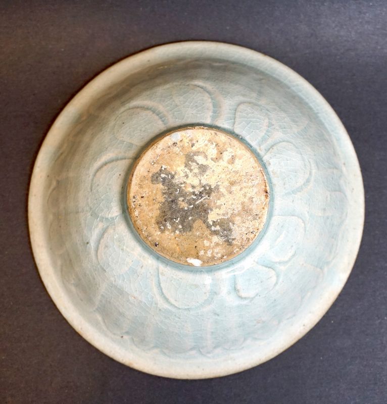 An Early Yuan Qingbai Porcelain Bowl with a Carved Duck&amp; Lotus Plant