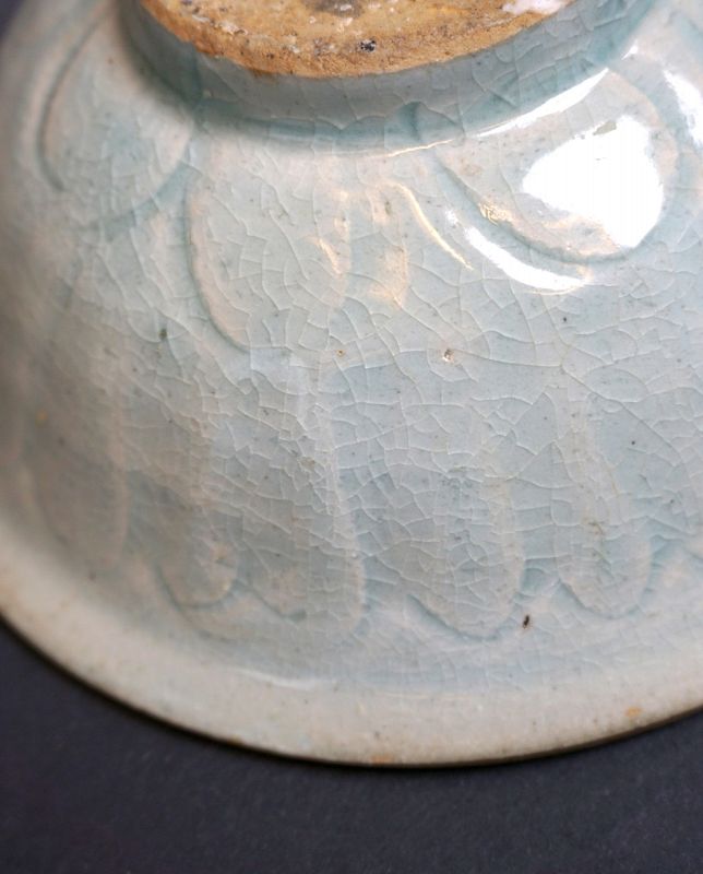 An Early Yuan Qingbai Porcelain Bowl with a Carved Duck&amp; Lotus Plant