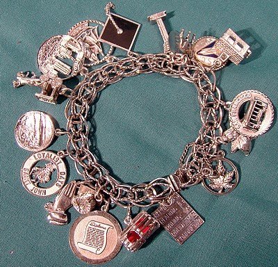 STERLING CHARM BRACELET 18 CHARMS 1960s (item #1159315)