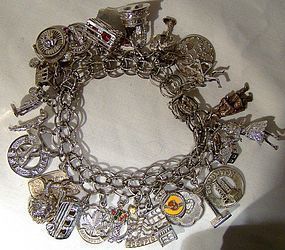 STERLING CHARM BRACELET with 28 CHARMS