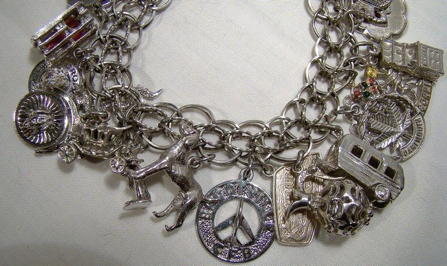 STERLING CHARM BRACELET with 28 CHARMS