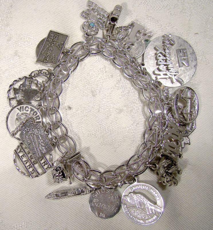 Early Chain Link Silver Plated Charm Bracelet with 24 Charms 1930s + (item  #1373202)