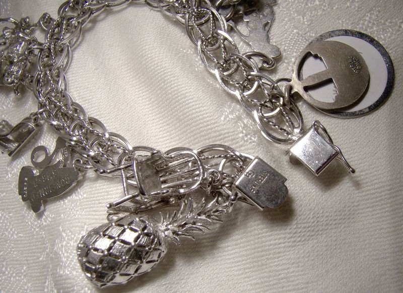 Double Link with Twist Sterling Silver Charm Bracelet with 15 Charms