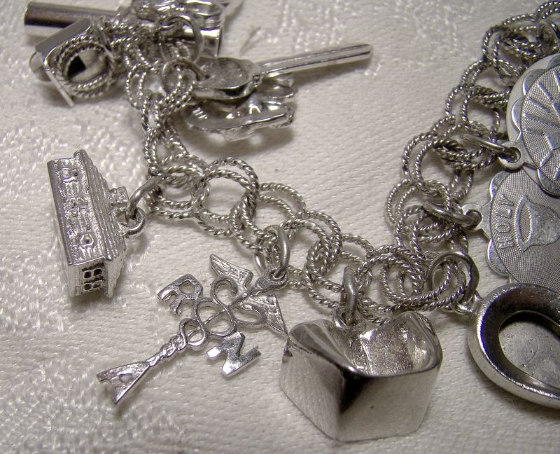Double Textured Links Sterling Silver Charm Bracelet with 22 Charms