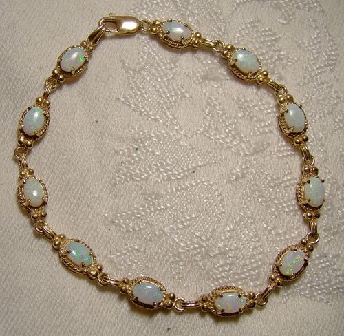 10K Yellow Gold Opals Tennis Bracelet with Lots of Colour 1970s