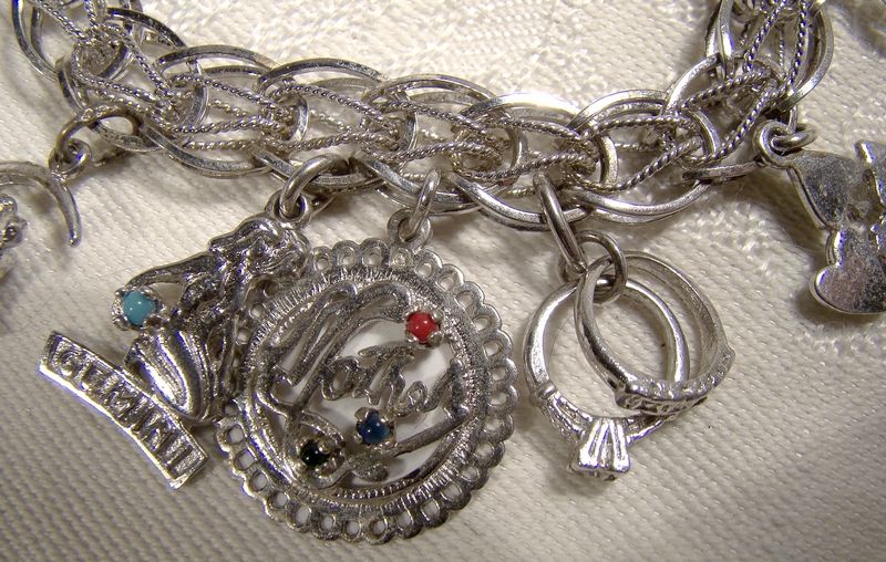 Double Oval Link with Twist Sterling Silver Charm Bracelet 11 Charms
