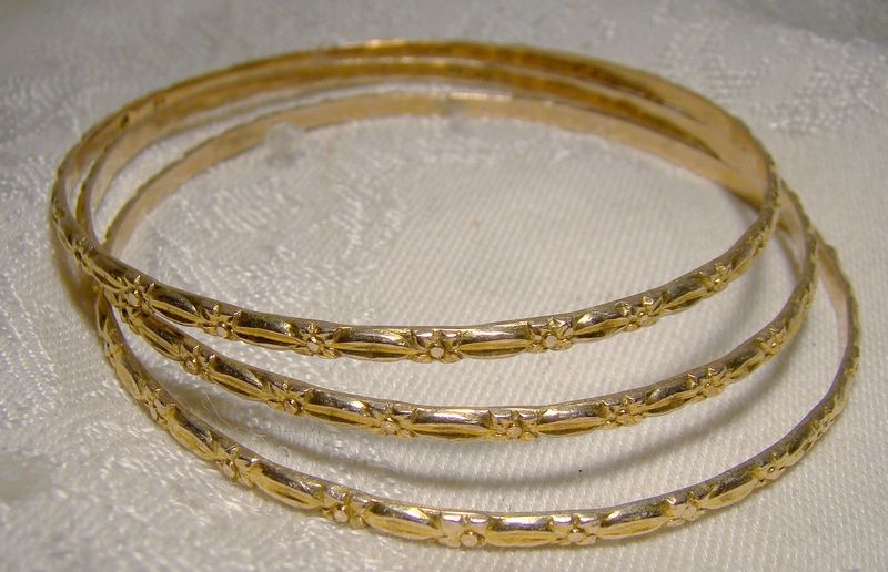 3 10k Yellow Gold Bangle Bracelets with Floral Motif