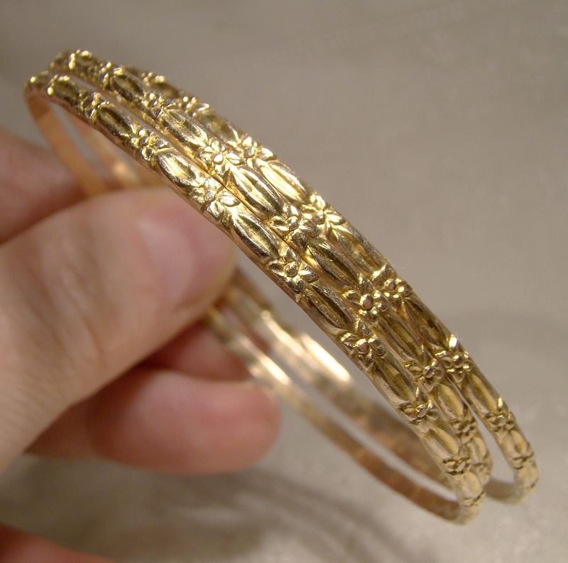 3 10k Yellow Gold Bangle Bracelets with Floral Motif
