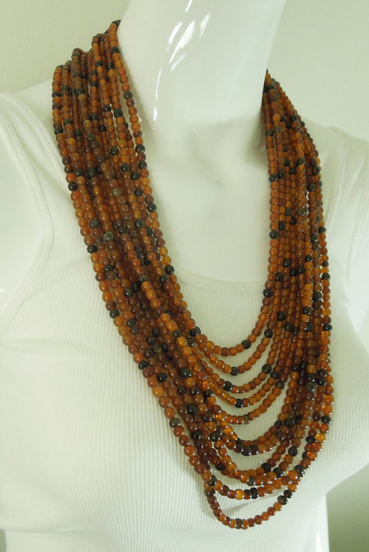 1980s Monies Carved Horn Bead 11 Strand Huge Necklace